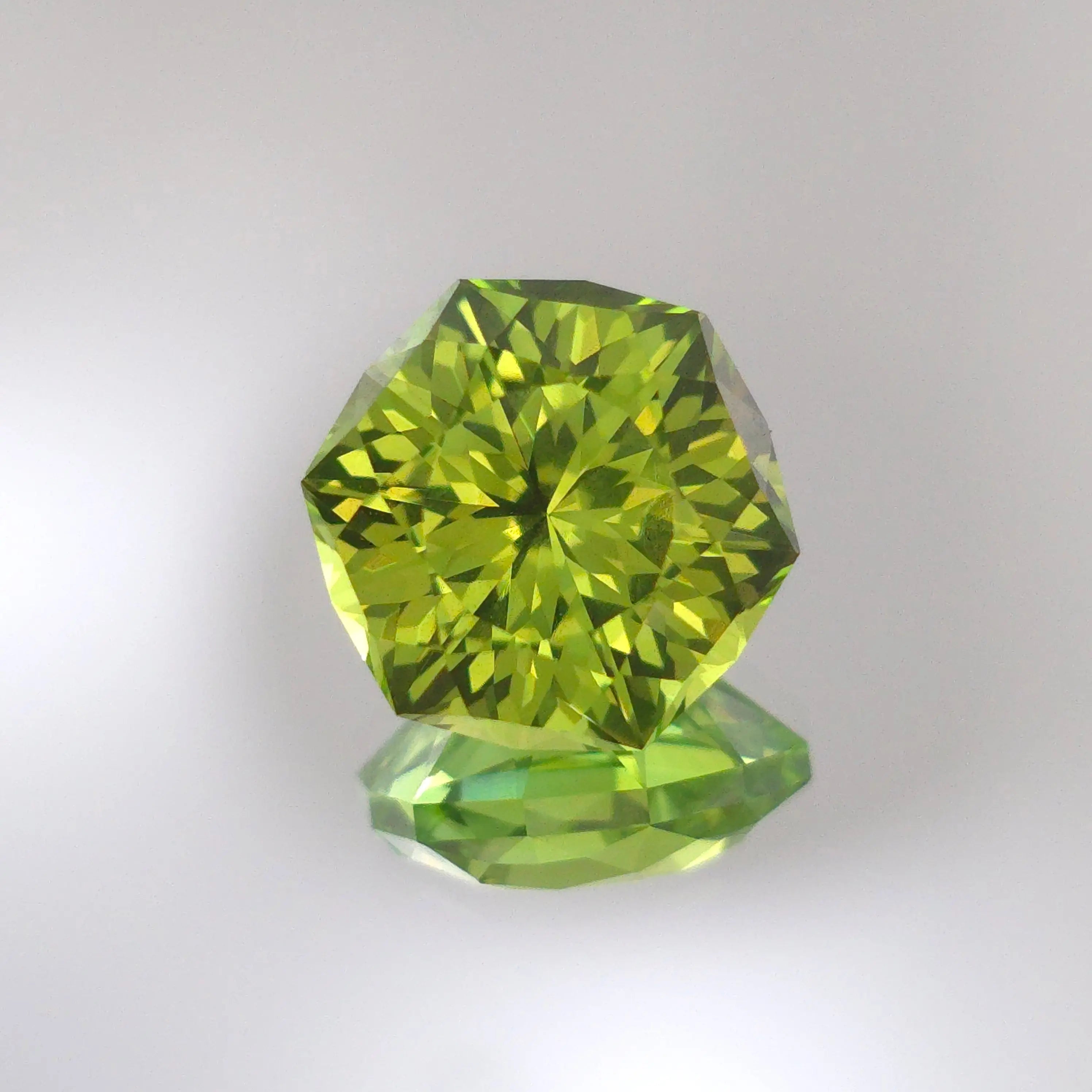Light Green Lab Sapphire In A Hexagon Cut 8.77mm x 8.8mm Optical Gains