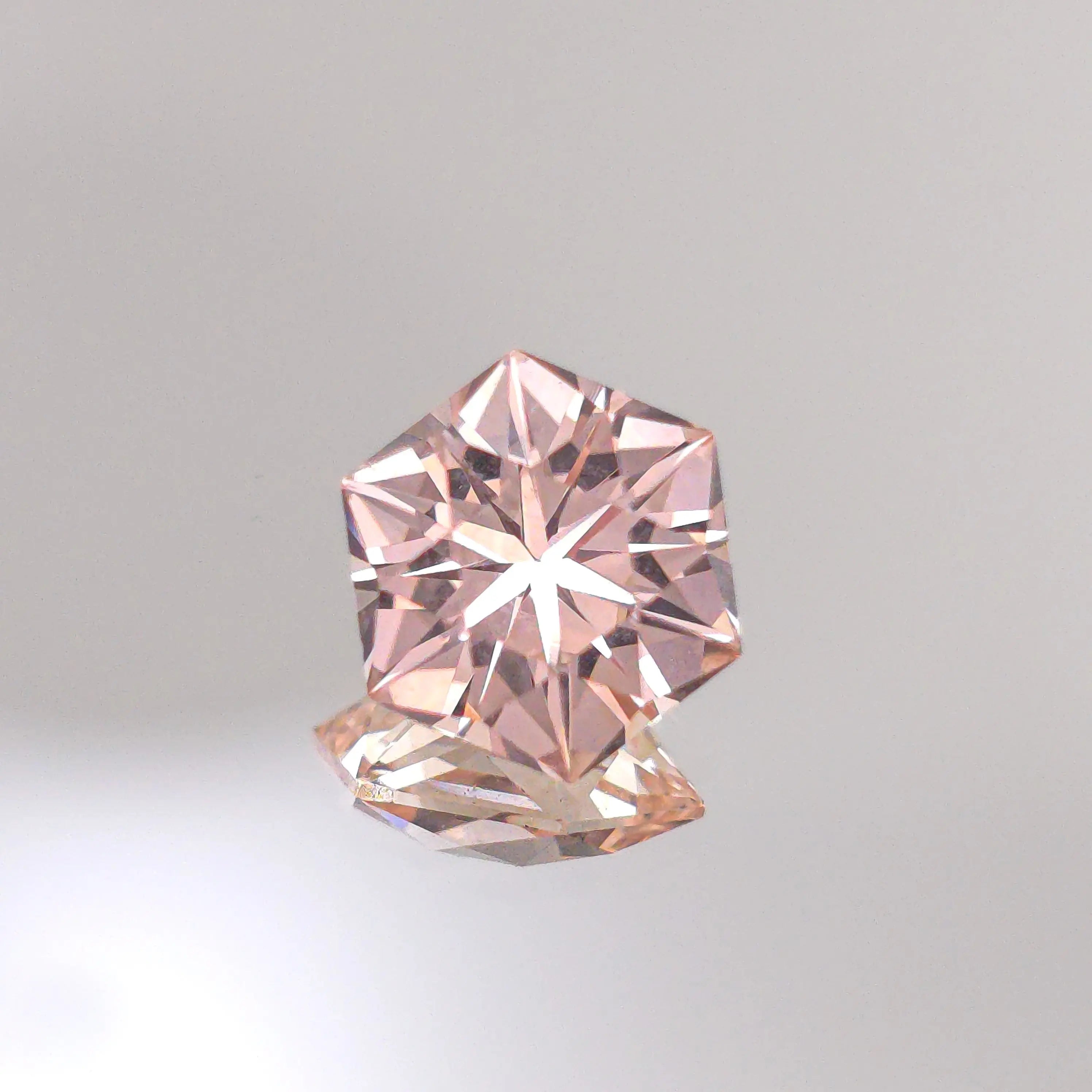 Light Pink Lab Sapphire In A Hexagon Design 6.87mm x 6.86mm Optical Gains