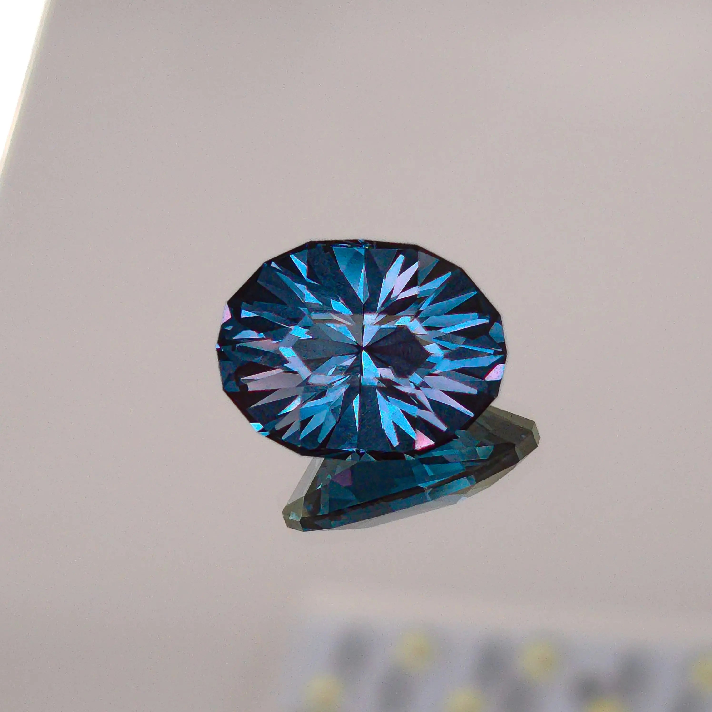 Teal lab Spinel Oval cut 10.58mm x 13.77mm Optical Gains